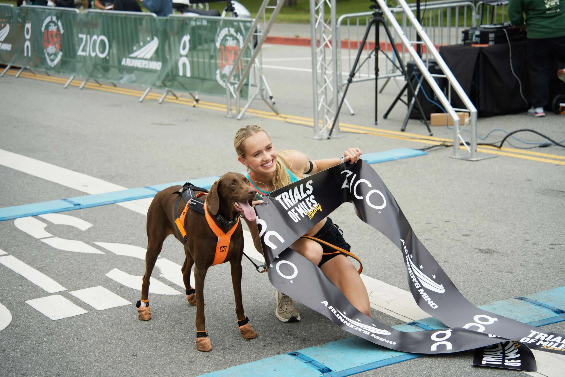 ‘It Feels Like You’re Flying’: She Ran a 4:31 Mile—with a Major Assist from Her Dog, Gigi
