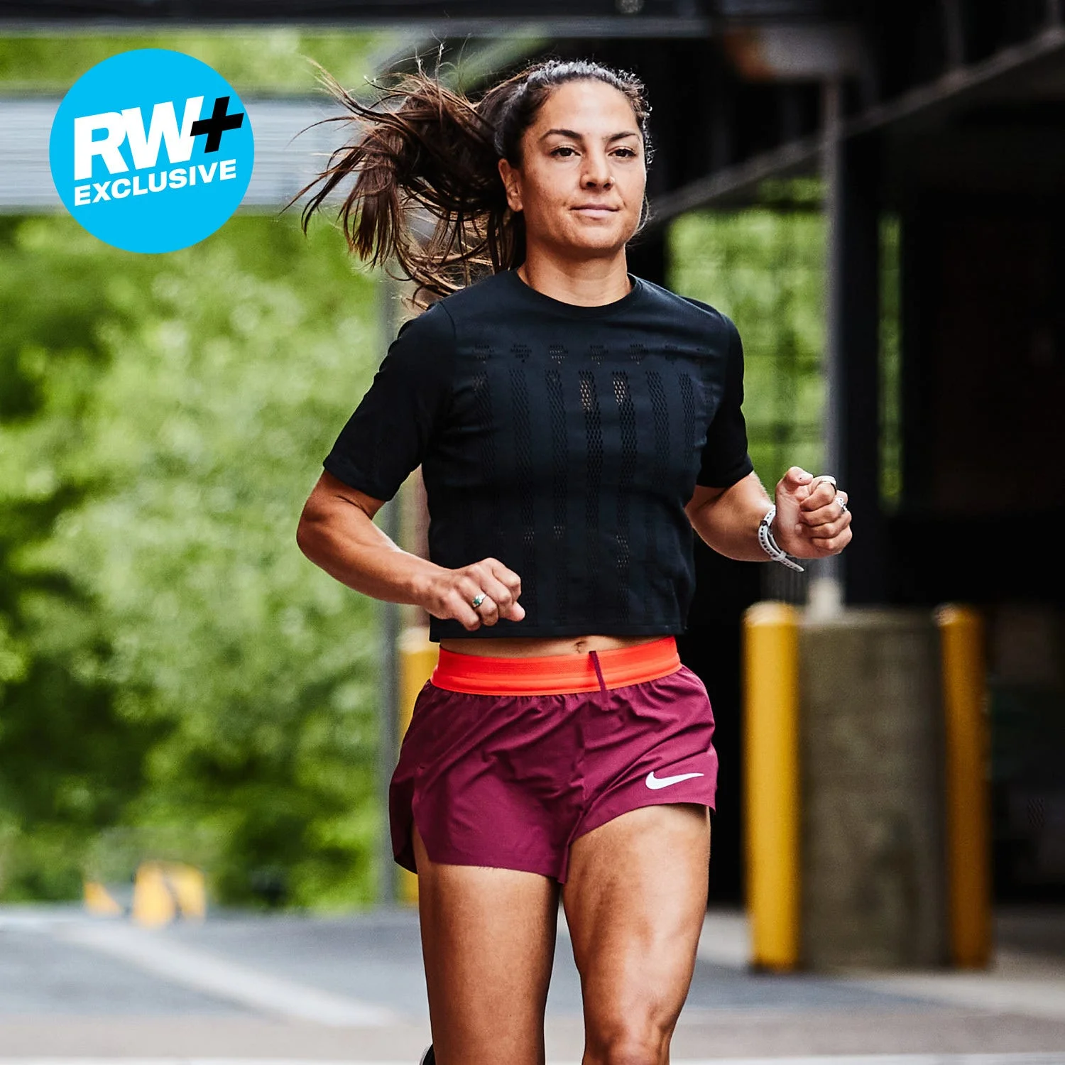 runner in motion wearing athletic clothing runner in motion wearing athletic clothing