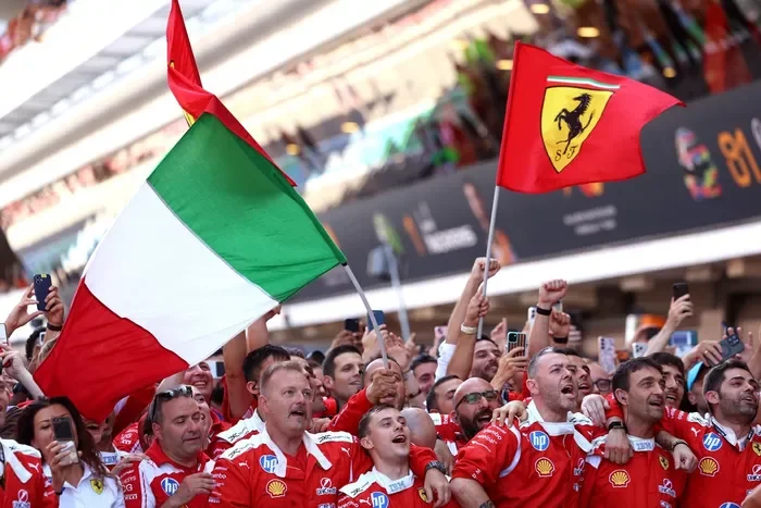The Ferrari team gathered at the podium ceremony 