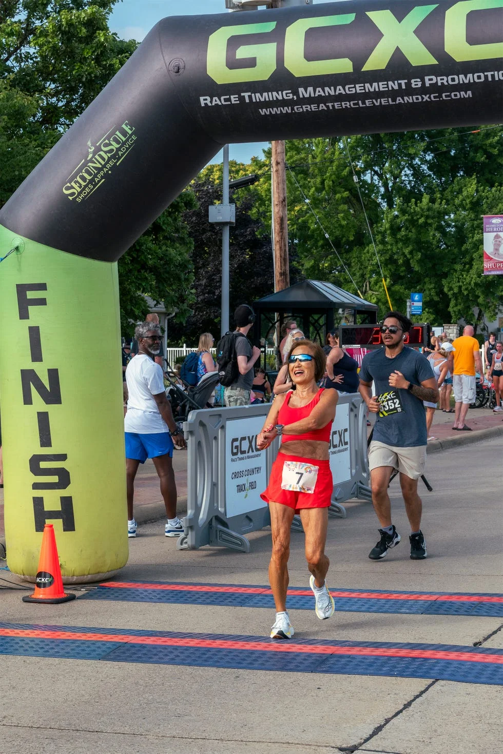 painsville, oh july 12 2025 jeannie rice (c) crossing the finishline of the johnnycake 5k. painsville, oh july 12 2025 jeannie rice (c) crossing the finishline of the johnnycake 5k.