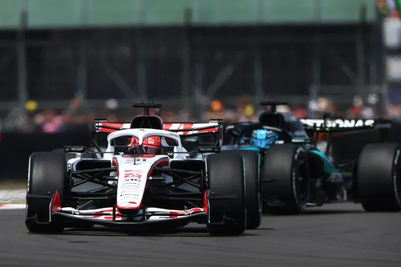 George Russell, Mercedes; Esteban Ocon, Haas F1 Team